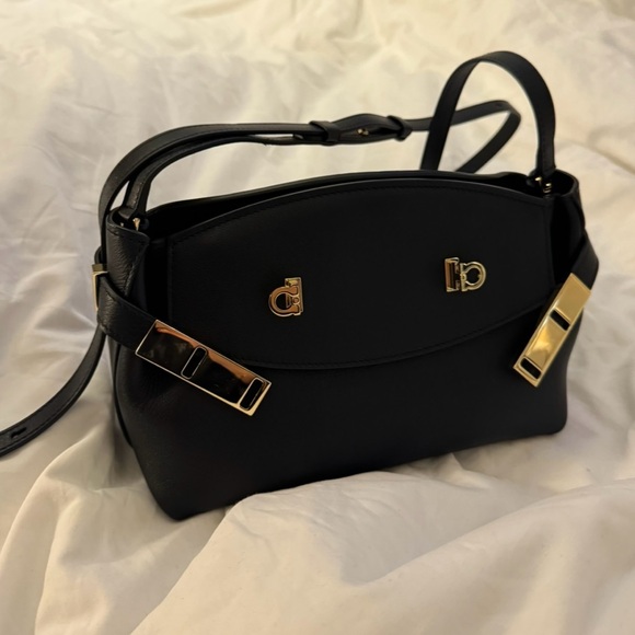 Ferragamo Hug Pouch bag in black and gold hardware - Picture 3 of 11